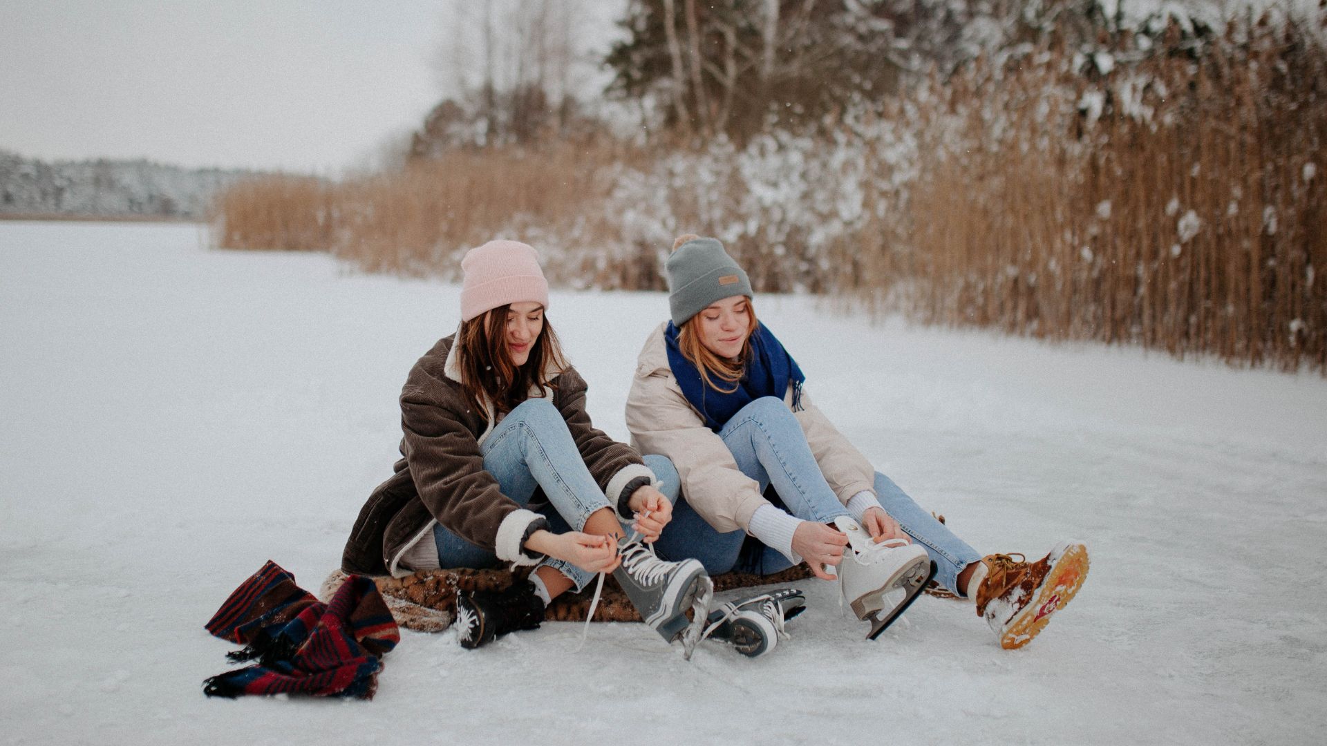 winter activities sudbury, 2 girls tying shoes